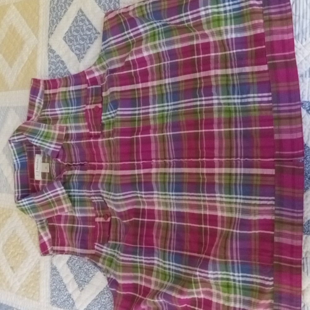 C.J. Banks sleeveless zipper Top